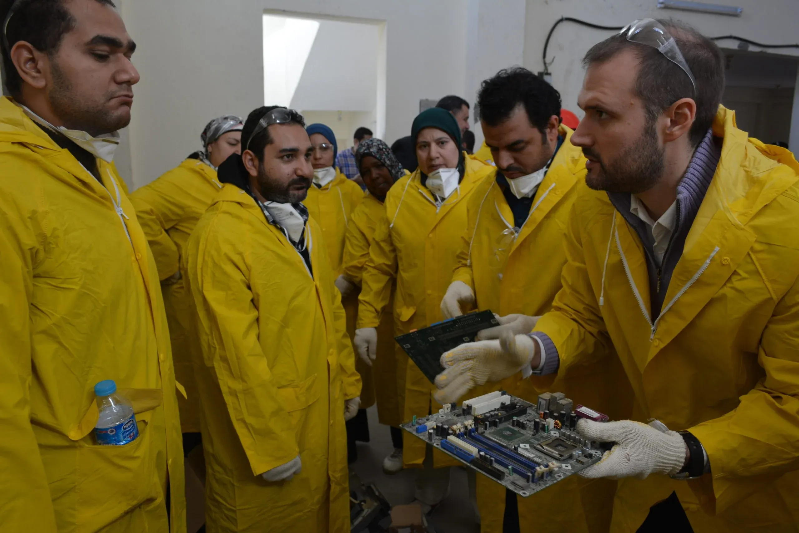EERC team training on dismantling computer circuit boards