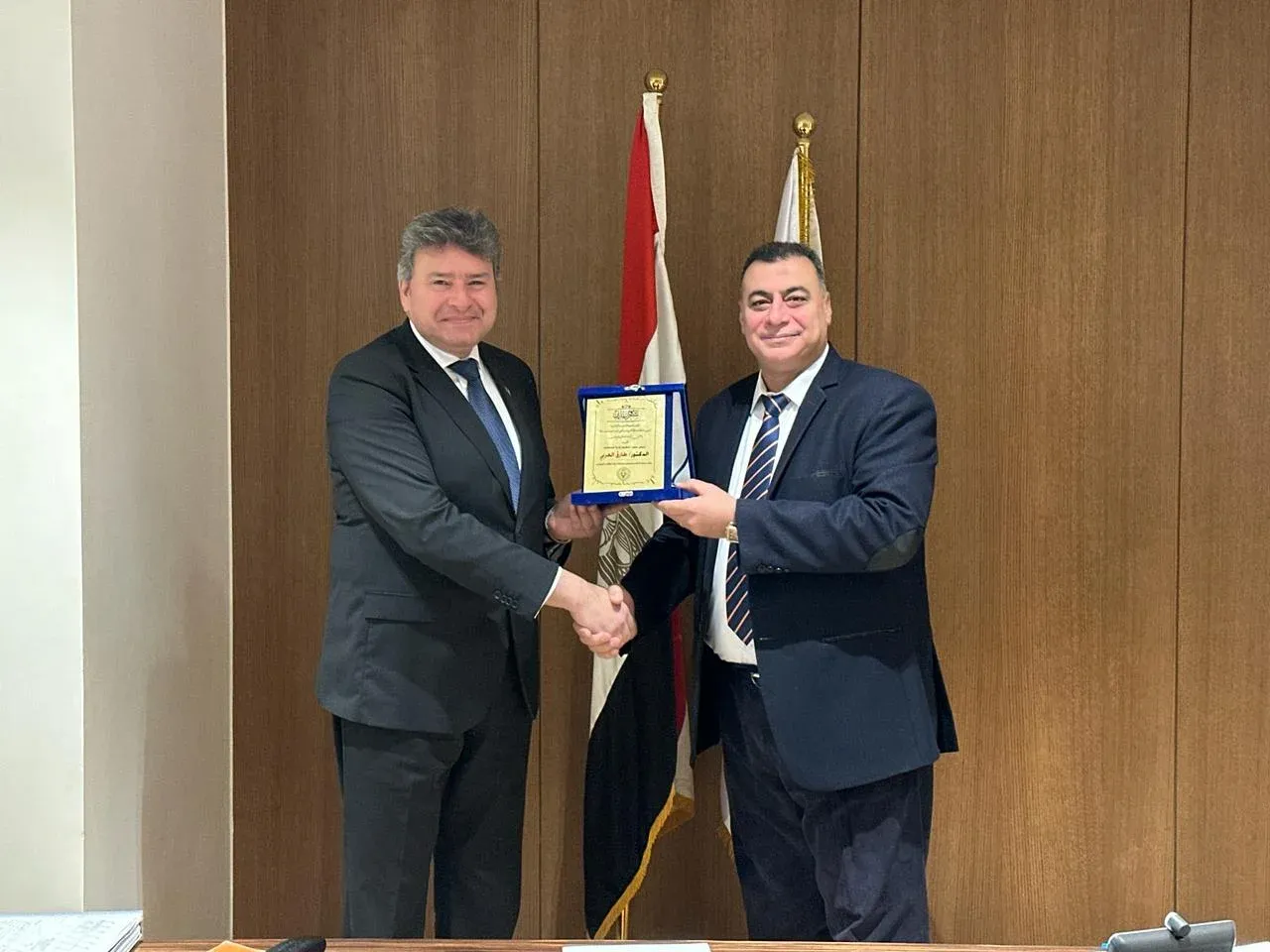 EERC receiving a plaque of appreciation